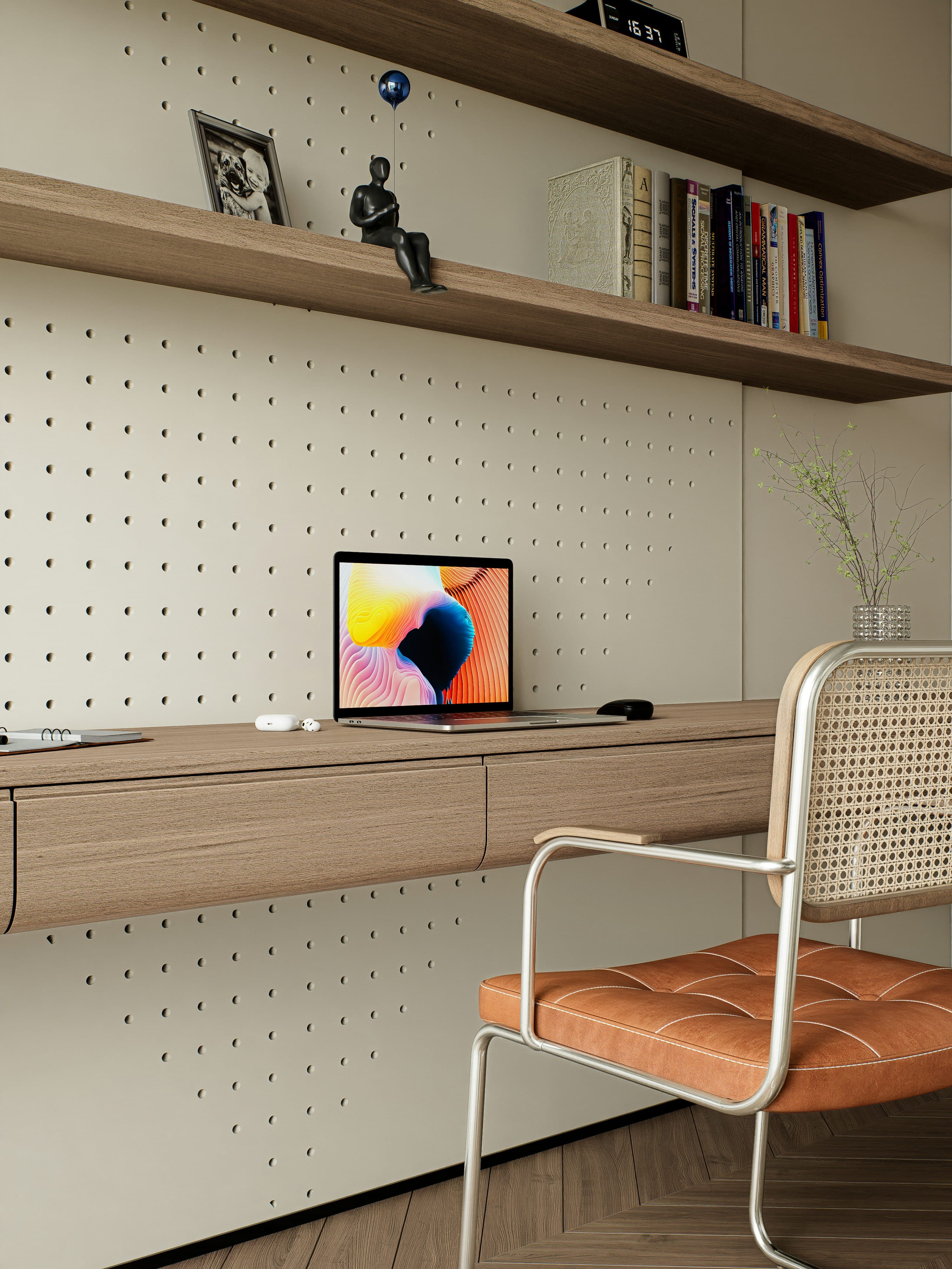 Espace de travail lumineux avec un ordinateur portable sur un bureau en bois.